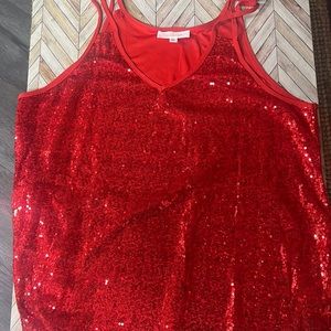 Red top. Lightly worn.